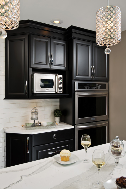Black cabinets with applicanes